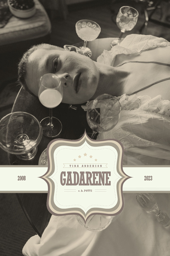 Young man lying on a table with a glass of absinthe in front of his eye and another empty glass beside him. Photo licensed from Cottonbro Studio.